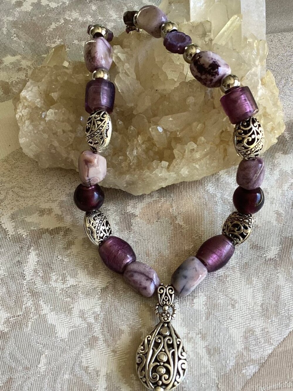 Handmade purple and silver beaded necklace with silver pendant, 22 inches